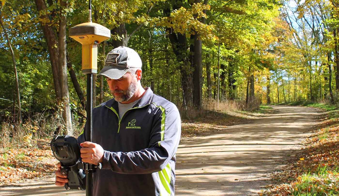 Licensed Land Surveyor at Work In Michigan